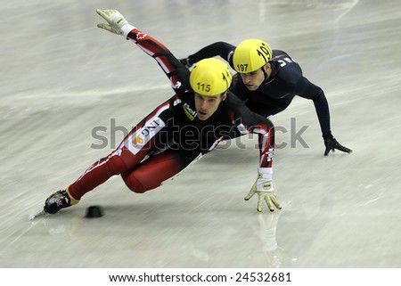 Sofia - February 6: OLIVIER Jean of Canada and SIMON Jeff of USA competes in the man\'s 1500 meters short track speed skating heats at the Samsung ISU World Cup on February 6 in Sofia ,Bulgaria.