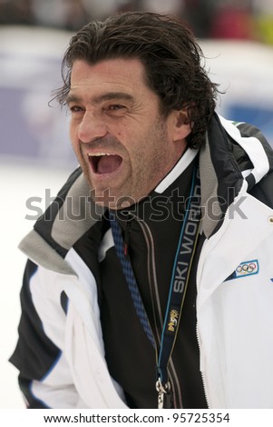 BANSKO, BULGARIA - FEBRUARY 18 : The Italian ski legend Alberto Tomba is guest of honor during the  Audi FIS Alpine Ski World Cup Men\'s Giant Slalom on February 18, 2012 in Bansko, Bulgaria.