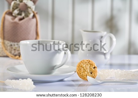 white coffee items on white table