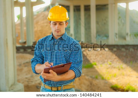 a young worker with clipboard