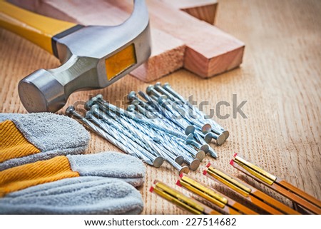 close up view on carpentry tools on wooden board
