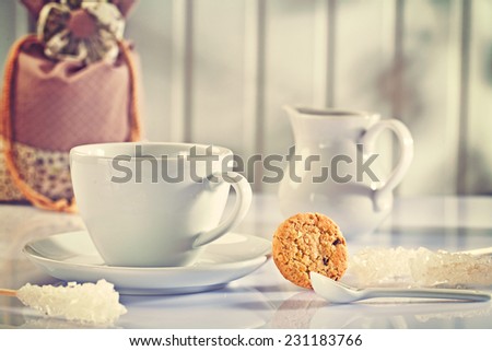 composition of white coffee items on white table instagram stile