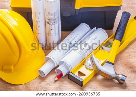 set of tools hammer level blueprints helmet pencil tool box construction concept