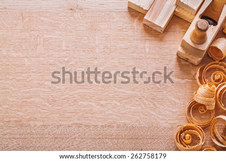 copyapce image wooden shavings old fashioned woodworkers plane planks on board horizontal version construction concept
