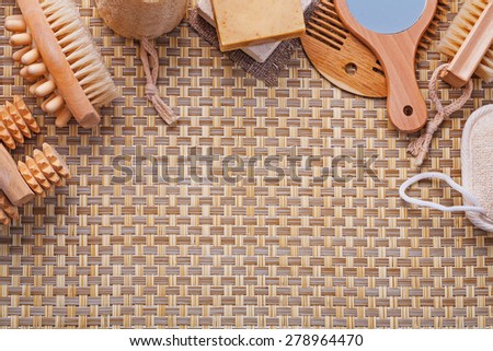 organized copyspace set of bathroom tools massagers nail brush sponge soap mirror hairbrush on mat