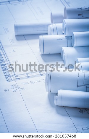 Rolls of engineering construction plans building concept