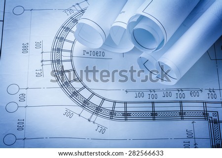 Rolls of construction plans building and architecture concept