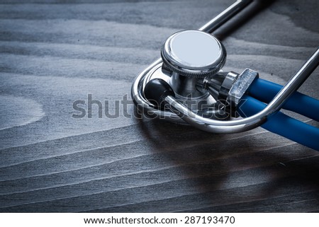 Medical diagnostic tool on wooden background medicine concept