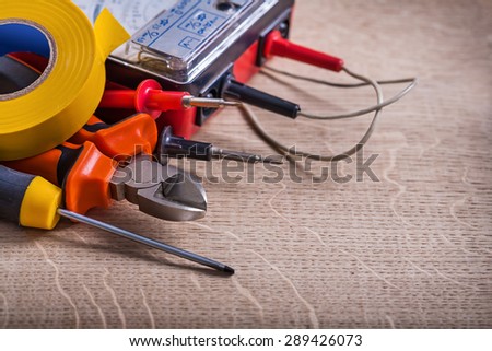 electric tester nippers screwdriver and insulating tape.