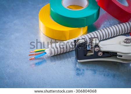 Automatic wire strippers conduct tubing cables and insulating tape.
