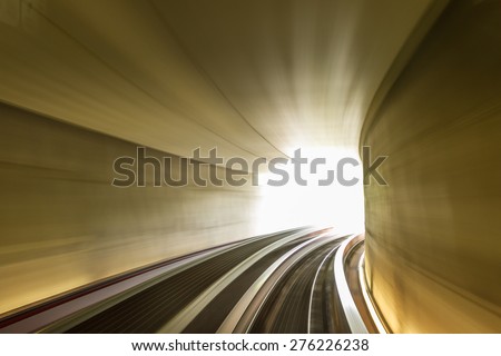 Tunnel of light. Subway tunnel with blurred light tracks - Concept of modern metro underground transport and connection speed. Motion blur effects due to long exposure shot