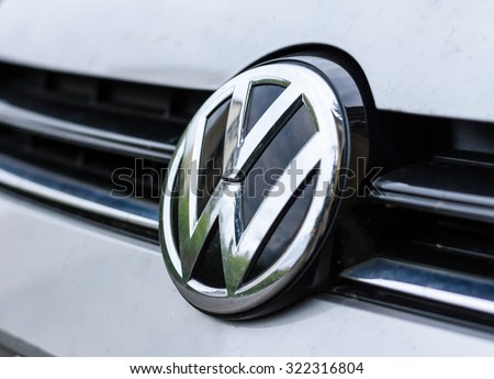 Firenze, Italy - September 28th 2015: Volkswagen plate logo on a modern car.\
Volkswagen is a famous European car manufacturer company based on Germany. Lens vignetting effect.