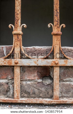 Antique rusty iron fence, white background