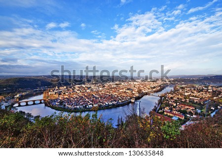 Panoramic view from above to Cahors town (France) surrounded by Lot river and hills
