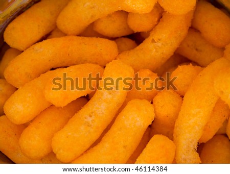 cheese curls puffs snack for background