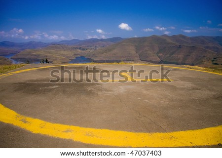 helipad in Lesotho overlooking the Katse dam high in the mountains, allowing access to the Lesotho Highlands water project