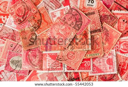 collection of red old postage stamps from different countries