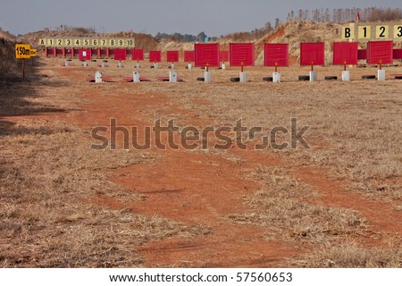 outdoor shooting range for rifles with red targets at different distances
