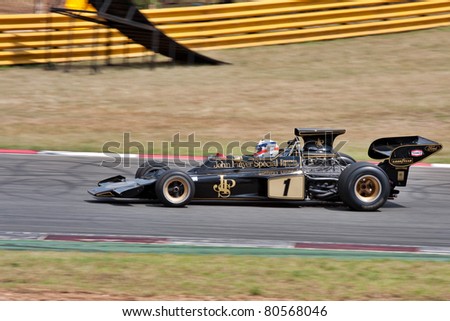 JOHANNESBURG, SOUTH AFRICA- MARCH 20: Historic Formula One racing car drives round the track at the Topgear Festival in a display race on  March 20, 2011 at Kyalami in Johannesburg, South Africa