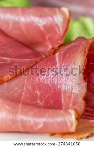 sliced and smoked ham with schwarzwald ham or prosciutto