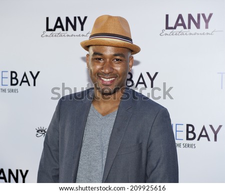 LOS ANGELES/CALIFORNIA - AUGUST 4, 2014: Actor Derrell Whitt walks the red carpet at \