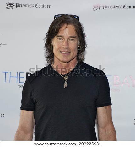 LOS ANGELES/CALIFORNIA - AUGUST 4, 2014: Actor and Musician Ron Moss walks   the red carpet at \