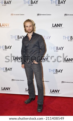 LOS ANGELES/CALIFORNIA - AUGUST 4, 2014: Thor Knai walks the red carpet at \
