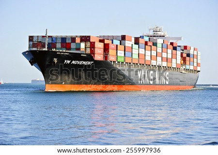 LOS ANGELES/CALIFORNIA - FEBRUARY 8, 2015: Yang Ming Marine Transport ship arrives at the Port of Los Angeles, the largest port in USA February 8, 2015 in San Pedro, California USA