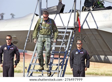 CHINO/CALIFORNIA - MAY 3, 2015: Captain John Cummings F-22 Raptor Demo Pilot as he disembarks and approaches onlookers at the Planes of Fame Airshow in Chino, California USA