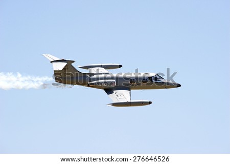 CHINO/CALIFORNIA - MAY 3, 2015: Special Ops Military Lear Jet displaying flying tactics at the Planes of Fame Airshow in Chino, California USA
