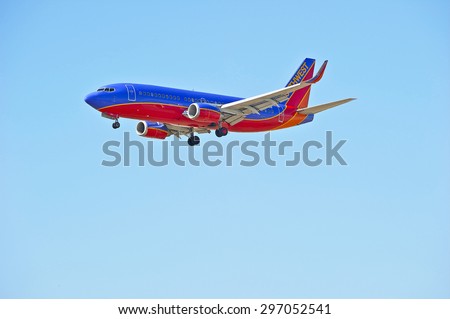 LOS ANGELES/CALIFORNIA - JULY 12, 2015: Southwest Airlines Boeing 737 on approach to runway at Los Angeles International Airport in Los Angeles, California, USA
