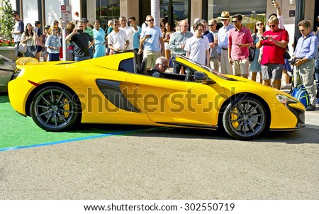 BEVERLY HILLS, CALIFORNIA - JUNE 21, 2015: 2015 McLaren sports car as it leaves the Rodeo Drive Concours D' Elegance on June 21, 2015 Beverly Hills, California, USA