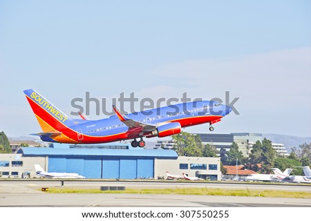 SANTA ANA/CALIFORNIA - AUG. 17, 2015: Southwest Airlines Boeing 737-700 commercial jet departs from John Wayne International Airport in Santa Ana, California, USA