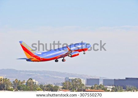 SANTA ANA/CALIFORNIA - AUG. 17, 2015: Southwest Airlines Boeing 737-700 commercial jet departs from John Wayne International Airport in Santa Ana, California, USA