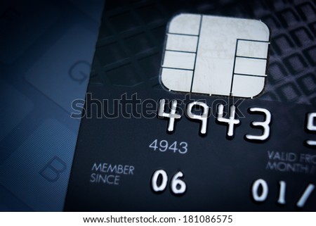 Low key macro shot close-up of credit card.