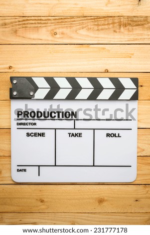 Movie slate film on wooden table
