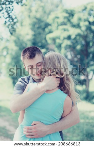 Lovely sensual couple in love, man embracing woman, warm feelings, vintage photo pastel color