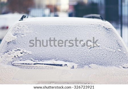Car covered snow, frozen back window vehicle winter