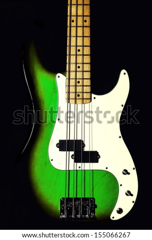 bass guitar. black background.close-up.green color