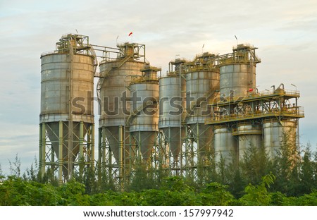 A group of processing silos in  concrete factory