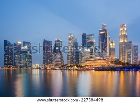 SINGAPORE-NOVEMBER 1: The Singapore skyline in twilight time on November 1,2014. Singapore is the 14th largest exporter and the 15th largest importer in the world