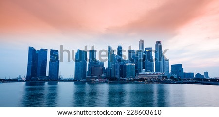 SINGAPORE-NOVEMBER 01: The Singapore skyline in twilight time on November 01,2014. Singapore is the 14th largest exporter and the 15th largest importer in the world