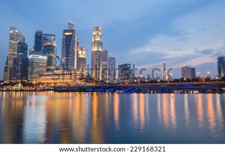 SINGAPORE-NOVEMBER 01: The Singapore skyline in twilight time on November 01,2014. Singapore is the 14th largest exporter and the 15th largest importer in the world