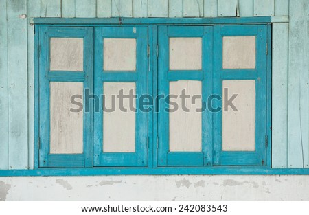 Closed windows of old wood house
