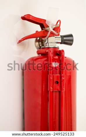 Mini Fire extinguisher tank on white background