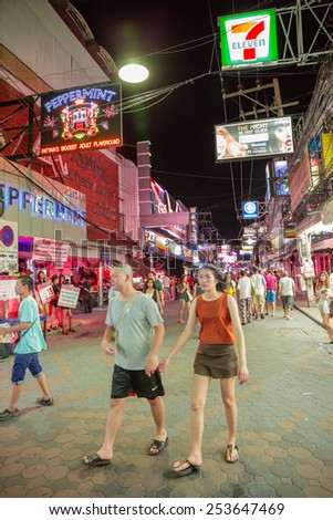 PATTAYA - FEBRUARY 17: Crowd are walking through the Walking Street on February 17, 2015 in Pattaya, Thailand. Its a tourist attraction primarily for night life and entertainment