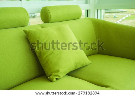 Green silk pillow on soft seat