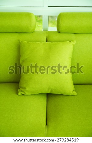 Green silk pillow on soft seat
