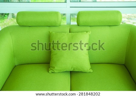 Pillow and soft sofa; green silk