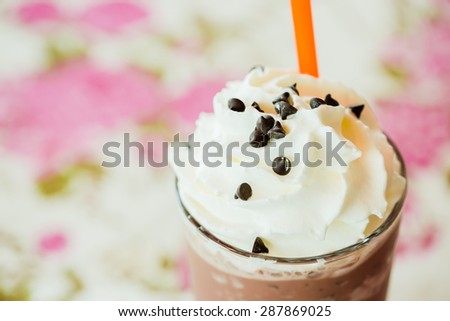 Iced cocoa and whipped cream topped with chocolate